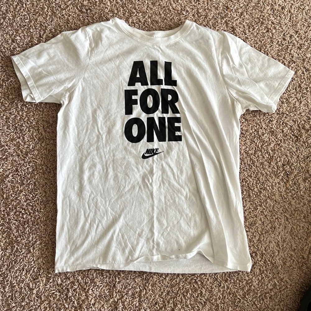 Used white Nike shirt size small.